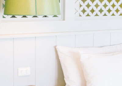 bed with green lamp